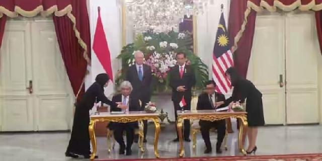 Bertemu PM Malaysia, Jokowi Minta Laut China Selatan Tak Jadi 