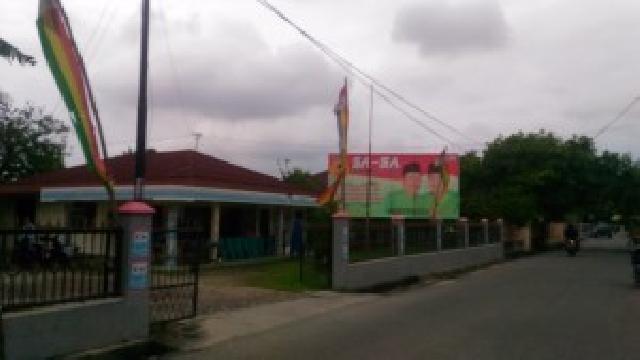 Masa Tenang Pilkada Pekanbaru, Baliho Sa-Sa Masih Mejeng di Jalan A Yani II